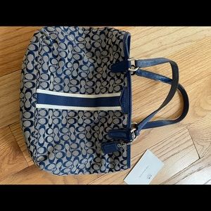 Coach small tote. Blue and grey. Used a few times. Great condition.